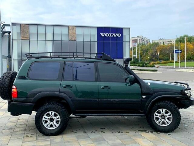 Зеленый Тойота Ленд Крузер, объемом двигателя 4.2 л и пробегом 350 тыс. км за 14600 $, фото 2 на Automoto.ua