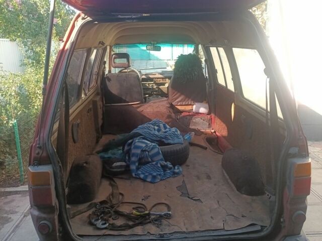 Красный Тойота Лит Айс, объемом двигателя 2 л и пробегом 400 тыс. км за 534 $, фото 1 на Automoto.ua