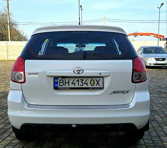 Білий Тойота Matrix, об'ємом двигуна 1.8 л та пробігом 260 тис. км за 55000 $, фото 6 на Automoto.ua