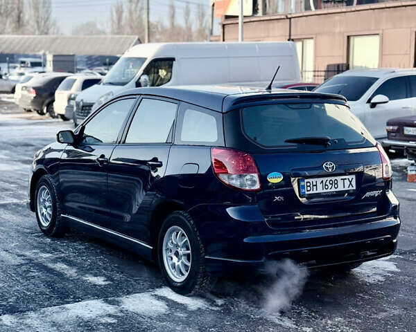 Синій Тойота Matrix, об'ємом двигуна 1.8 л та пробігом 250 тис. км за 4999 $, фото 9 на Automoto.ua