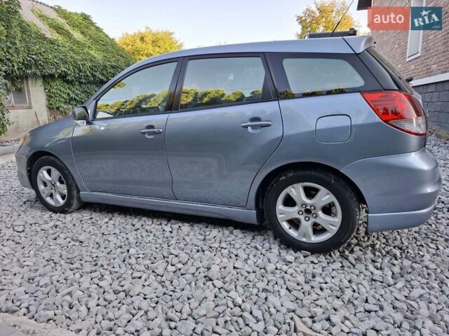 Синій Тойота Matrix, об'ємом двигуна 1.8 л та пробігом 247 тис. км за 4700 $, фото 14 на Automoto.ua