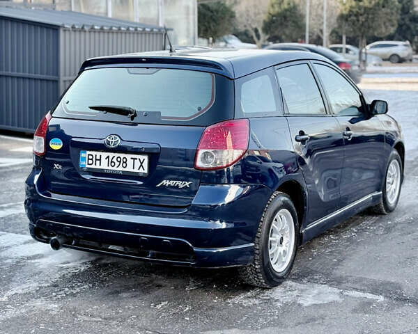 Синій Тойота Matrix, об'ємом двигуна 1.8 л та пробігом 250 тис. км за 4999 $, фото 7 на Automoto.ua