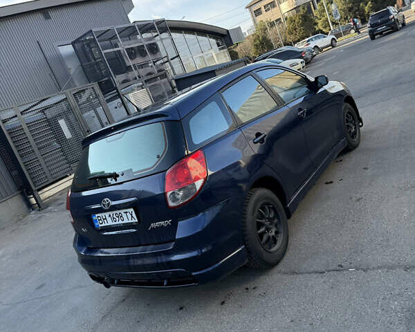 Синій Тойота Matrix, об'ємом двигуна 1.79 л та пробігом 250 тис. км за 4999 $, фото 5 на Automoto.ua