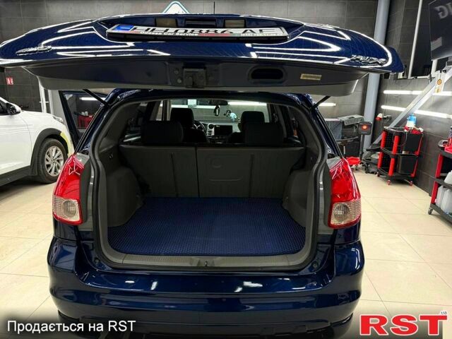 Синій Тойота Matrix, об'ємом двигуна 1.8 л та пробігом 167 тис. км за 5800 $, фото 10 на Automoto.ua