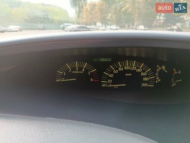 Синій Тойота Превіа, об'ємом двигуна 2 л та пробігом 197 тис. км за 6500 $, фото 12 на Automoto.ua