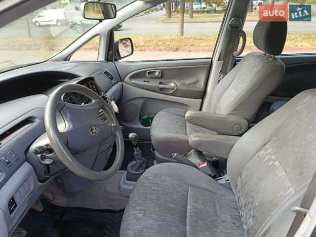 Синій Тойота Превіа, об'ємом двигуна 2 л та пробігом 197 тис. км за 6500 $, фото 18 на Automoto.ua