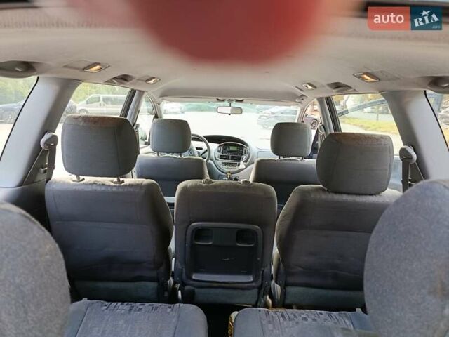 Синій Тойота Превіа, об'ємом двигуна 2 л та пробігом 197 тис. км за 6500 $, фото 10 на Automoto.ua