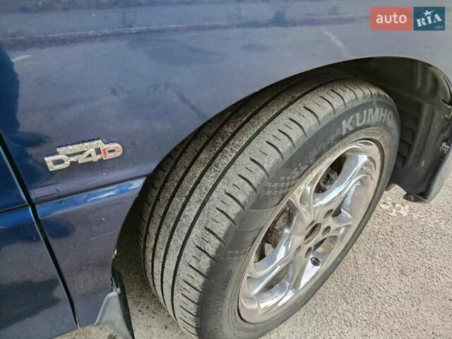 Синій Тойота Превіа, об'ємом двигуна 2 л та пробігом 197 тис. км за 6500 $, фото 4 на Automoto.ua