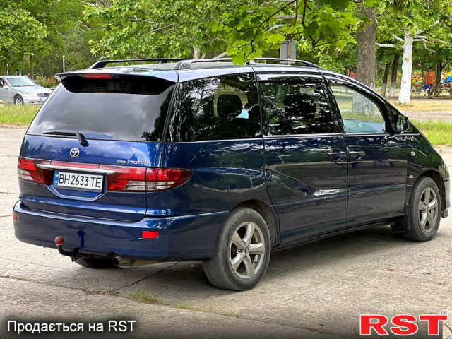 Синий Тойота Превиа, объемом двигателя 2 л и пробегом 276 тыс. км за 7400 $, фото 3 на Automoto.ua