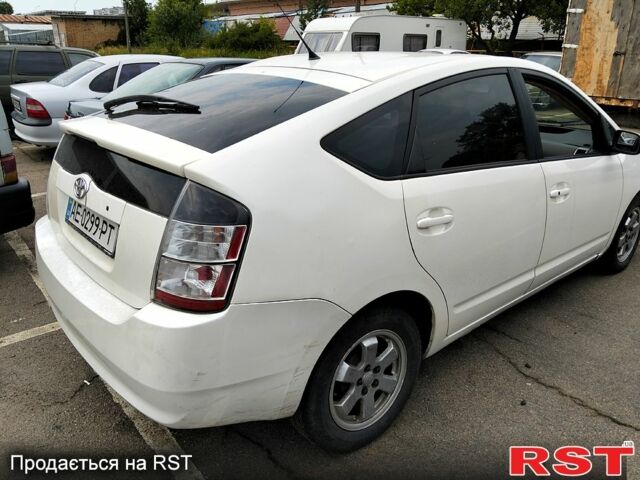 Белый Тойота Приус, объемом двигателя 1.5 л и пробегом 314 тыс. км за 2450 $, фото 2 на Automoto.ua