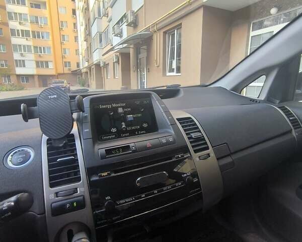 Белый Тойота Приус, объемом двигателя 1.5 л и пробегом 274 тыс. км за 8000 $, фото 2 на Automoto.ua