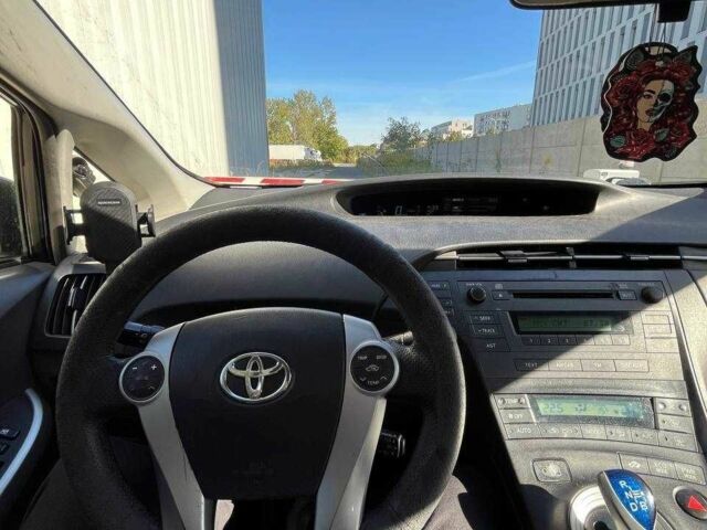 Білий Тойота Пріус, об'ємом двигуна 1.8 л та пробігом 380 тис. км за 9035 $, фото 10 на Automoto.ua