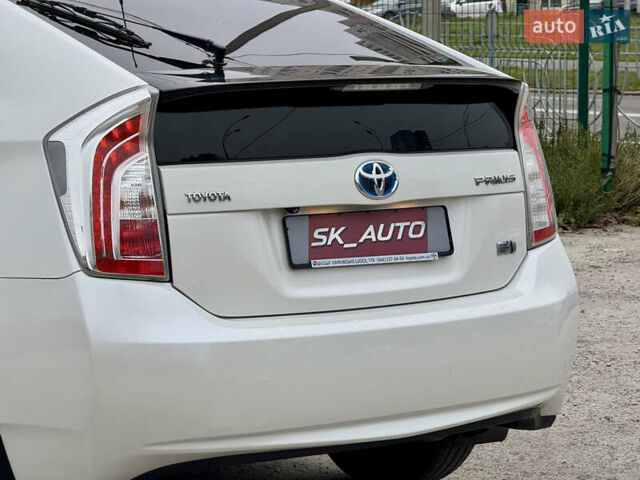 Белый Тойота Приус, объемом двигателя 1.8 л и пробегом 165 тыс. км за 12800 $, фото 94 на Automoto.ua