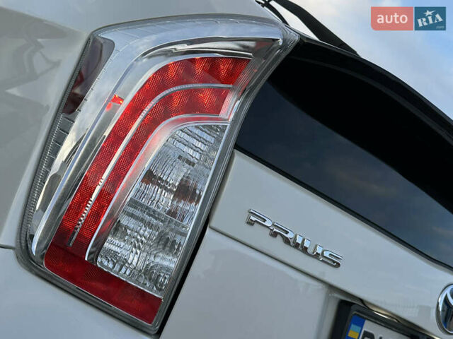 Белый Тойота Приус, объемом двигателя 1.8 л и пробегом 235 тыс. км за 11700 $, фото 29 на Automoto.ua
