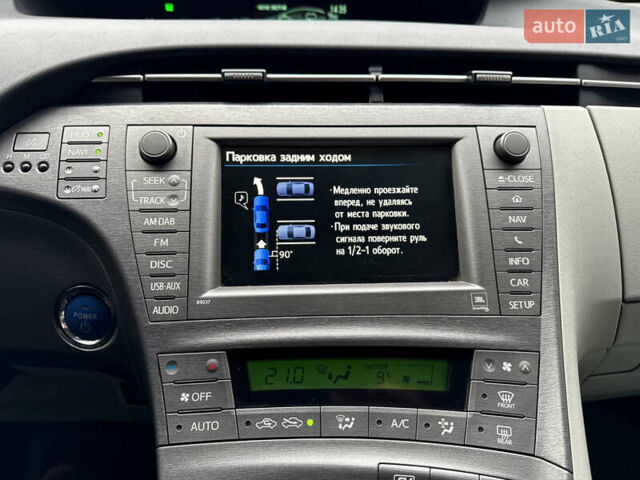 Белый Тойота Приус, объемом двигателя 1.8 л и пробегом 165 тыс. км за 12700 $, фото 48 на Automoto.ua