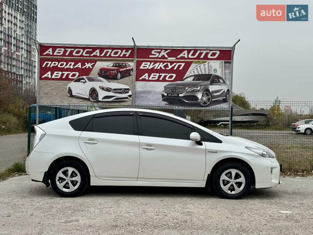 Белый Тойота Приус, объемом двигателя 1.8 л и пробегом 165 тыс. км за 12800 $, фото 77 на Automoto.ua