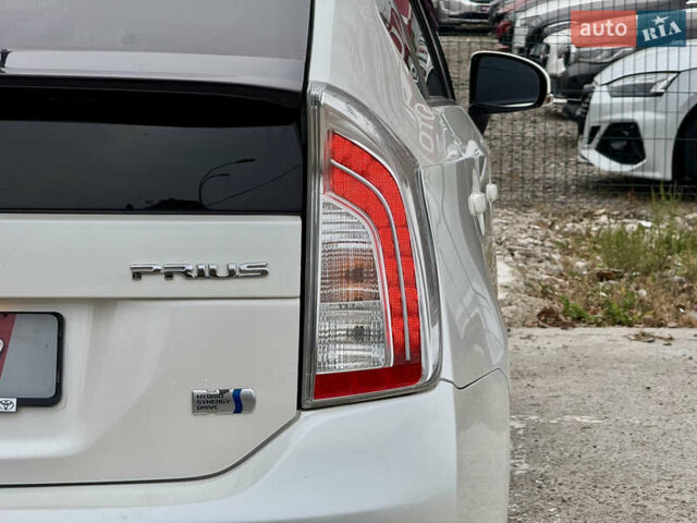 Белый Тойота Приус, объемом двигателя 1.8 л и пробегом 165 тыс. км за 12700 $, фото 85 на Automoto.ua