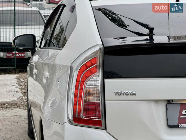 Белый Тойота Приус, объемом двигателя 1.8 л и пробегом 165 тыс. км за 12700 $, фото 92 на Automoto.ua