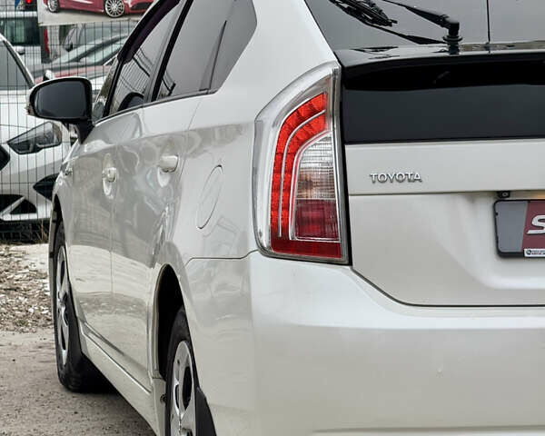 Белый Тойота Приус, объемом двигателя 1.8 л и пробегом 165 тыс. км за 12800 $, фото 90 на Automoto.ua