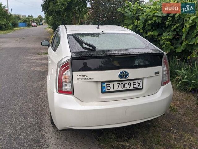 Белый Тойота Приус, объемом двигателя 1.8 л и пробегом 179 тыс. км за 12500 $, фото 2 на Automoto.ua