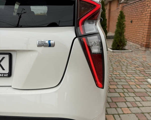 Белый Тойота Приус, объемом двигателя 1.8 л и пробегом 134 тыс. км за 14800 $, фото 11 на Automoto.ua