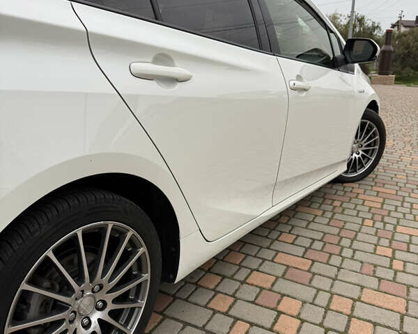 Белый Тойота Приус, объемом двигателя 1.8 л и пробегом 134 тыс. км за 14800 $, фото 38 на Automoto.ua