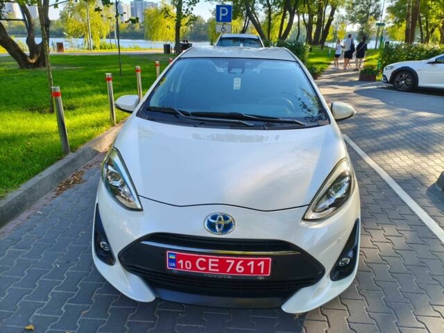 Білий Тойота Пріус, об'ємом двигуна 1.5 л та пробігом 73 тис. км за 12800 $, фото 1 на Automoto.ua