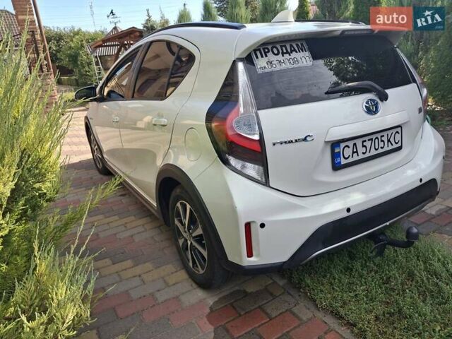 Білий Тойота Пріус, об'ємом двигуна 1.5 л та пробігом 126 тис. км за 13850 $, фото 1 на Automoto.ua