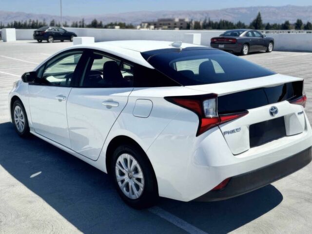 Білий Тойота Пріус, об'ємом двигуна 1.8 л та пробігом 32 тис. км за 15000 $, фото 4 на Automoto.ua