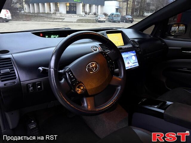 Черный Тойота Приус, объемом двигателя 1.5 л и пробегом 300 тыс. км за 7000 $, фото 11 на Automoto.ua