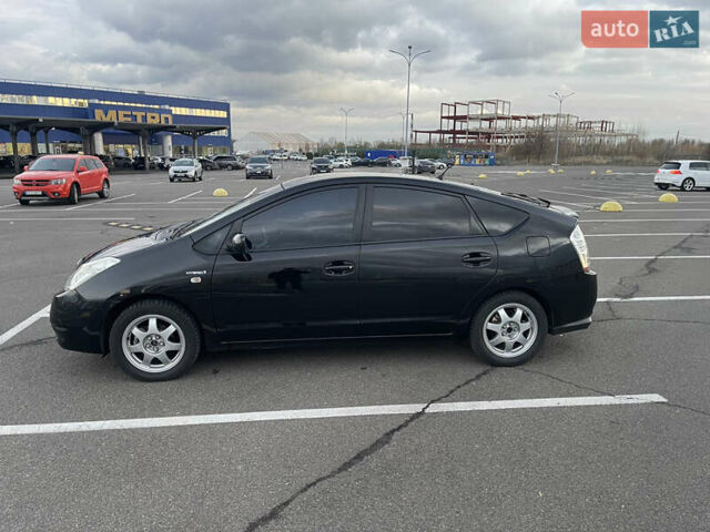 Черный Тойота Приус, объемом двигателя 1.5 л и пробегом 304 тыс. км за 5900 $, фото 1 на Automoto.ua
