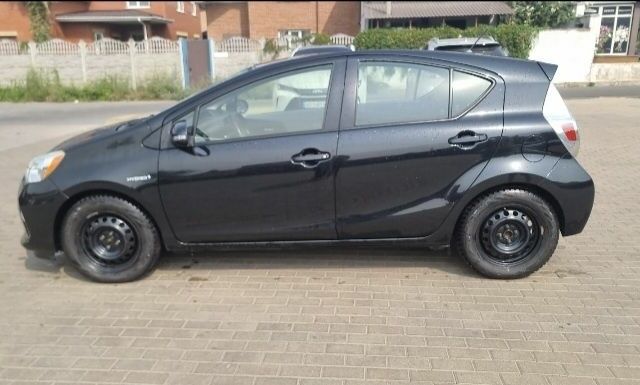 Черный Тойота Приус, объемом двигателя 1.5 л и пробегом 106 тыс. км за 10700 $, фото 1 на Automoto.ua