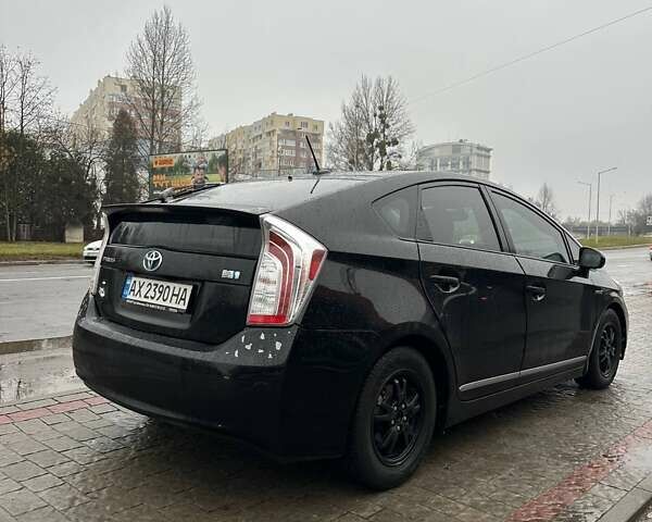 Черный Тойота Приус, объемом двигателя 1.8 л и пробегом 101 тыс. км за 10800 $, фото 1 на Automoto.ua
