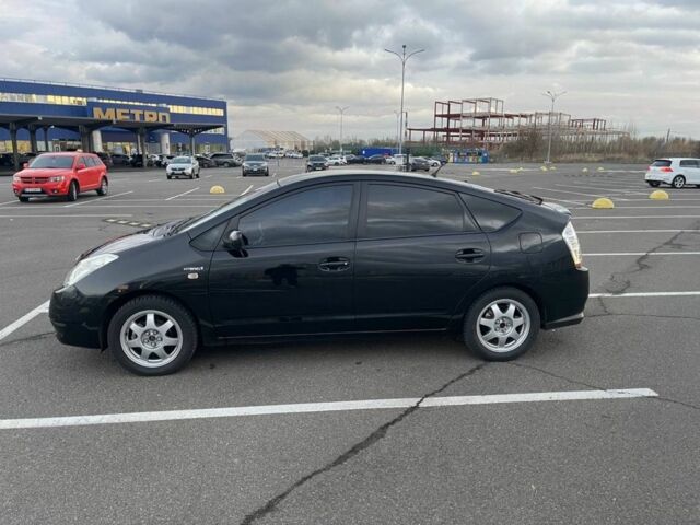 Черный Тойота Приус, объемом двигателя 1.5 л и пробегом 304 тыс. км за 6000 $, фото 1 на Automoto.ua