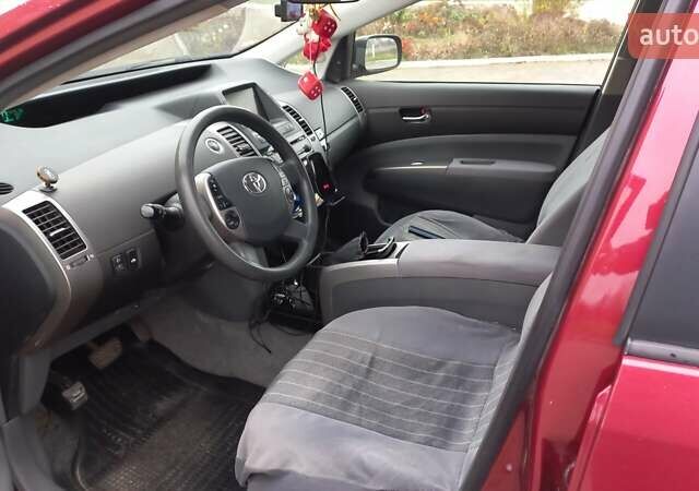 Красный Тойота Приус, объемом двигателя 1.5 л и пробегом 226 тыс. км за 6500 $, фото 22 на Automoto.ua