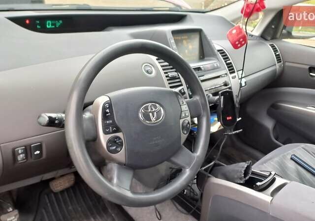 Красный Тойота Приус, объемом двигателя 1.5 л и пробегом 226 тыс. км за 6500 $, фото 23 на Automoto.ua