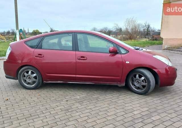 Красный Тойота Приус, объемом двигателя 1.5 л и пробегом 226 тыс. км за 6500 $, фото 6 на Automoto.ua