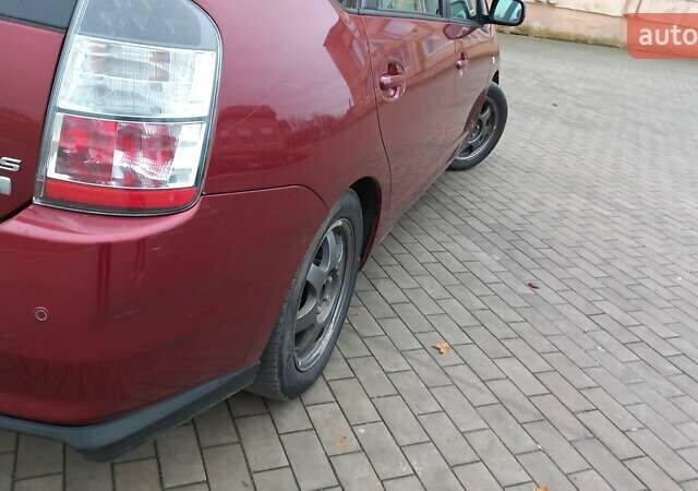 Красный Тойота Приус, объемом двигателя 1.5 л и пробегом 226 тыс. км за 6500 $, фото 11 на Automoto.ua