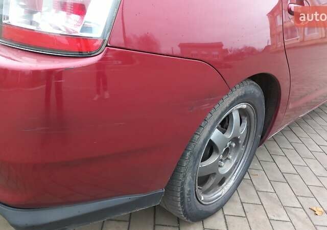 Красный Тойота Приус, объемом двигателя 1.5 л и пробегом 226 тыс. км за 6500 $, фото 10 на Automoto.ua