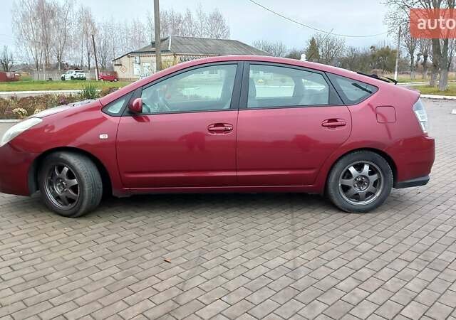 Красный Тойота Приус, объемом двигателя 1.5 л и пробегом 226 тыс. км за 6500 $, фото 18 на Automoto.ua
