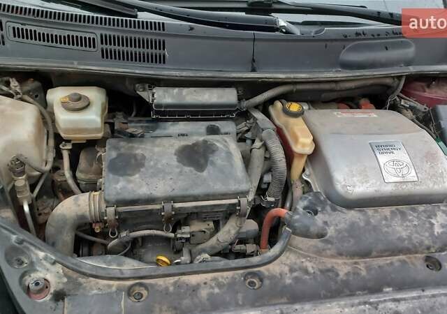 Красный Тойота Приус, объемом двигателя 1.5 л и пробегом 226 тыс. км за 6500 $, фото 33 на Automoto.ua