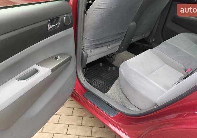 Красный Тойота Приус, объемом двигателя 1.5 л и пробегом 226 тыс. км за 6500 $, фото 26 на Automoto.ua