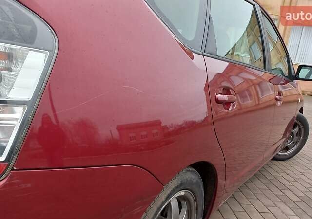 Красный Тойота Приус, объемом двигателя 1.5 л и пробегом 226 тыс. км за 6500 $, фото 9 на Automoto.ua