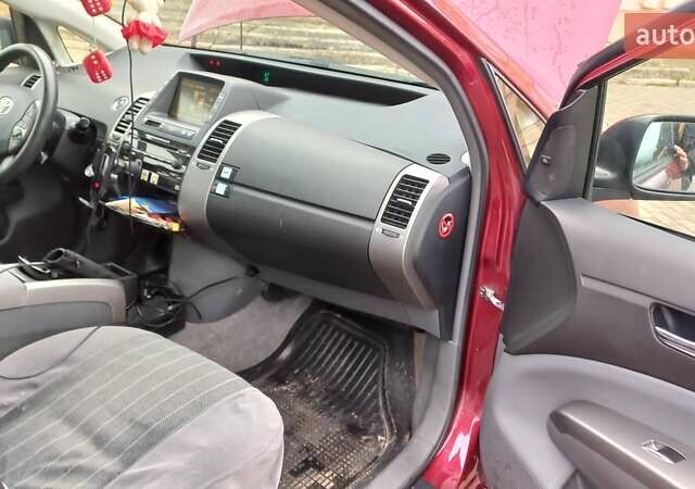 Красный Тойота Приус, объемом двигателя 1.5 л и пробегом 226 тыс. км за 6500 $, фото 31 на Automoto.ua