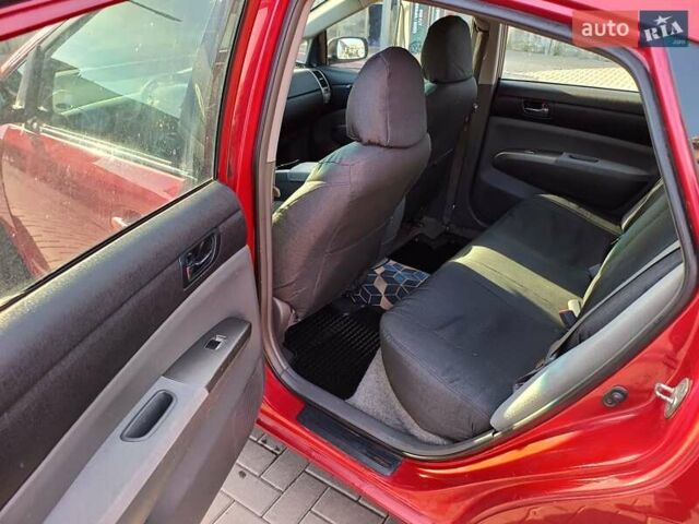 Червоний Тойота Пріус, об'ємом двигуна 1.5 л та пробігом 192 тис. км за 3999 $, фото 5 на Automoto.ua