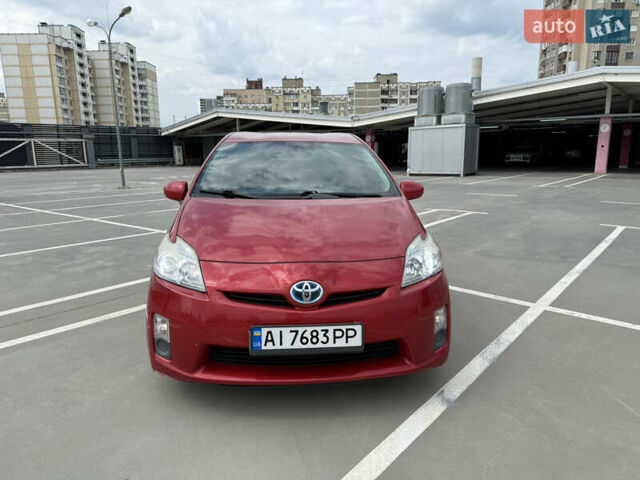 Красный Тойота Приус, объемом двигателя 1.8 л и пробегом 296 тыс. км за 9400 $, фото 1 на Automoto.ua