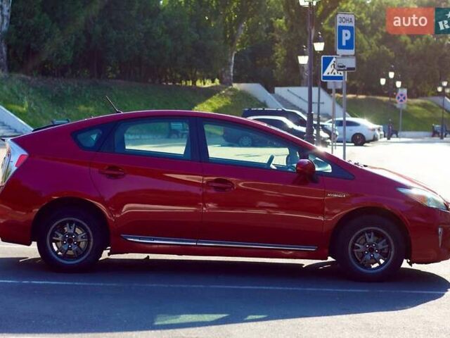 Красный Тойота Приус, объемом двигателя 1.8 л и пробегом 176 тыс. км за 10800 $, фото 2 на Automoto.ua