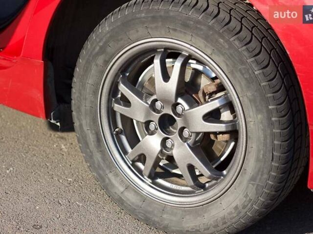 Красный Тойота Приус, объемом двигателя 1.8 л и пробегом 176 тыс. км за 10800 $, фото 19 на Automoto.ua