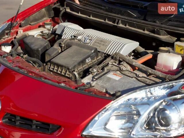 Красный Тойота Приус, объемом двигателя 1.8 л и пробегом 176 тыс. км за 10800 $, фото 20 на Automoto.ua