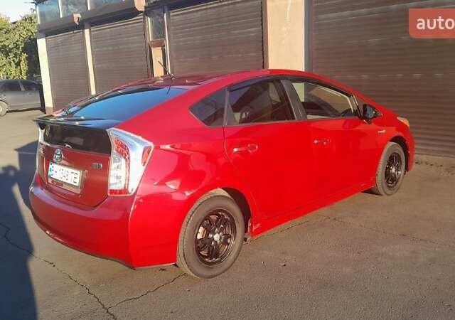 Красный Тойота Приус, объемом двигателя 1.8 л и пробегом 200 тыс. км за 10500 $, фото 1 на Automoto.ua